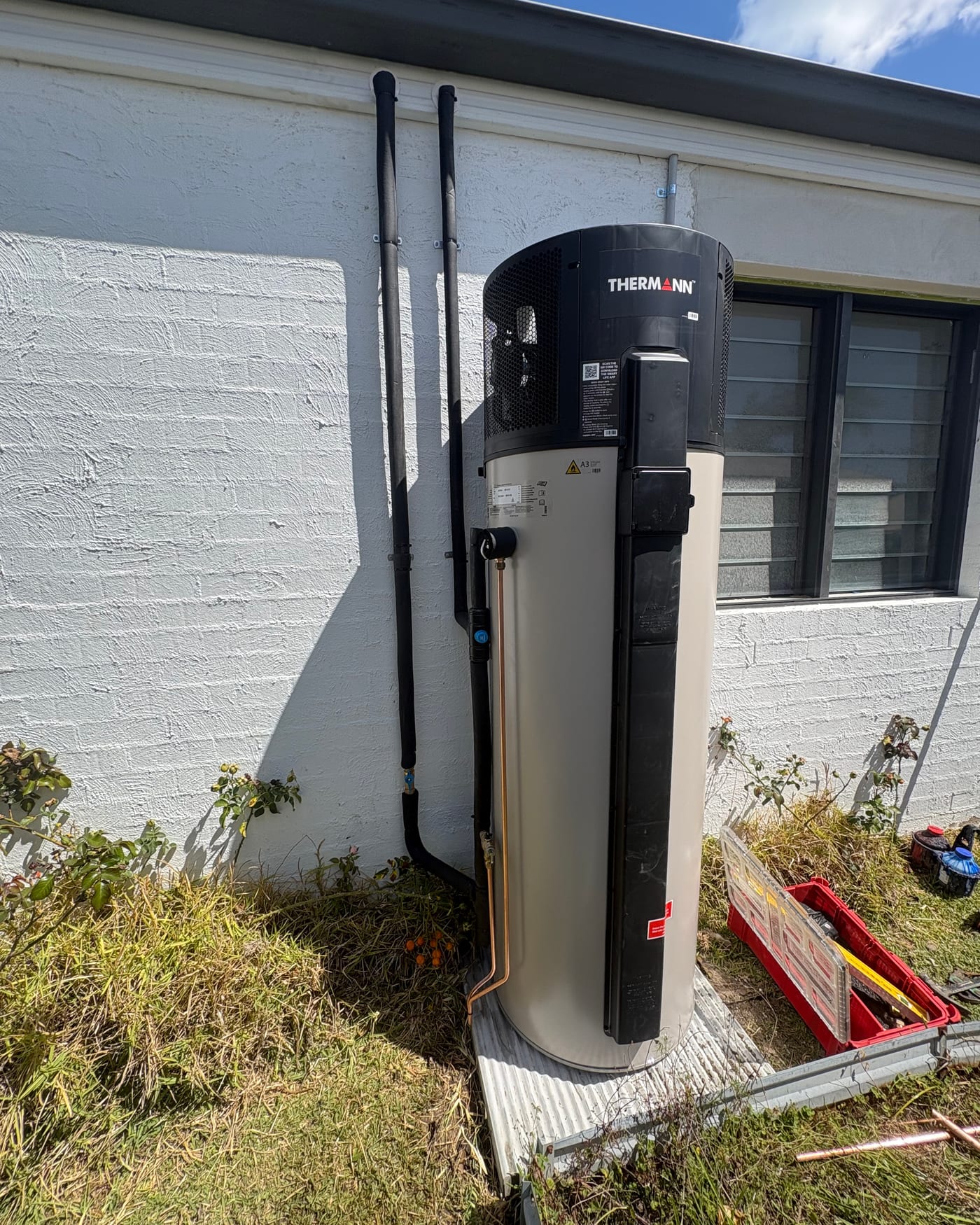 Heat pump hot water system installed by Pure Plumbing & Gas Solutions